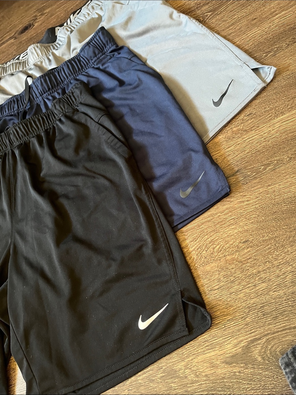Three pairs Nike Men's Athletic Shorts - Black, Navy, Light Gray - Picture 3 of 3